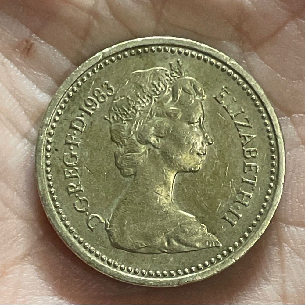 1983 One Pound coin error upside down rim Queen Elizabeth II rare